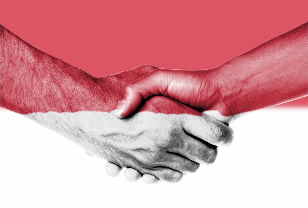 Candidate and new employer shaking hands